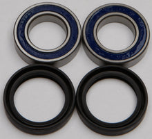 Load image into Gallery viewer, All Balls front wheel bearing and seal kit with various bearings and seals laid out on a white background