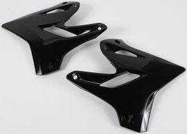 Black Acerbis radiator shrouds for motorcycle, featuring sleek design and durable plastic construction.