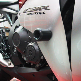 Black Shogun Industries frame sliders for motorcycle body protection, designed to absorb impact and prevent damage.