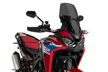 Load image into Gallery viewer, PUIG Touring Dark Smoke Windscreen for motorcycle, showcasing tinted, aerodynamic shield with mounting hardware.
