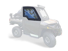 Load image into Gallery viewer, Kolpin front upper soft doors for off-road vehicle, showing black fabric and plastic frames in a natural outdoor setting.