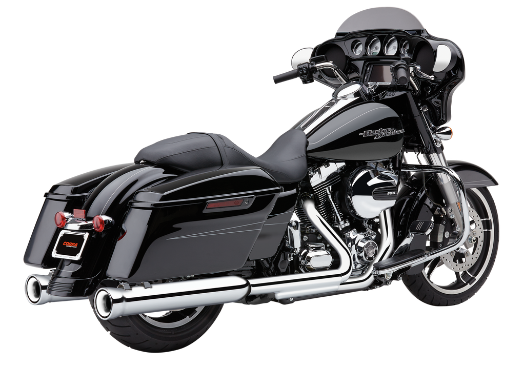 Cobra 4-inch NH slip-on exhaust with chrome finish installed on Indian motorcycle, showcasing polished metal and branding details.
