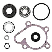 Vertex Water Pump Rebuild Kit 680-1875 for engine, includes gasket and components, displayed on a workbench.