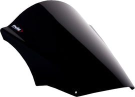 Black PUIG racing windscreen for motorcycle, showcasing the sleek, aerodynamic design and mounting edges.