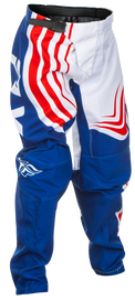 Fly Racing Youth F-16 Pants in red, white, and blue, size 26, featuring durable motocross gear with reinforced knee areas.