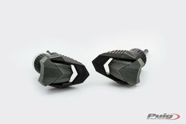 Black PUIG Frame Sliders for R19 Kawasaki motorcycle, showing the sleek body protection with mounting hardware.