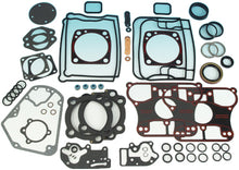 Load image into Gallery viewer, James Gasket motor gasket kit with MLS head gaskets, shown with multiple gasket seals and components for engine sealing.