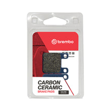 Load image into Gallery viewer, Brembo Prime CC brake pads made of carbon ceramic with the Brembo logo, designed for high-performance braking systems.