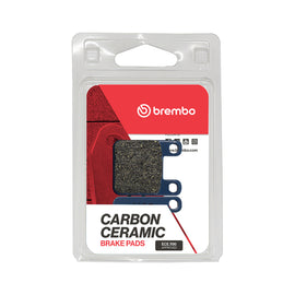 Brembo Prime CC brake pads made of carbon ceramic with the Brembo logo, designed for high-performance braking systems.