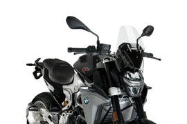 Clear PUIG windscreen for BMW Ng Sport motorcycle, showing a sleek, transparent windshield mounted on the bike.