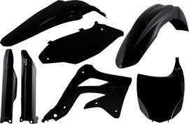 Acerbis black full plastic kit with various panels and components laid out on a white background.