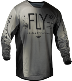 Fly Racing Youth Kinetic Prodigy jersey in black and light grey, designed for motocross or dirt bike riding.