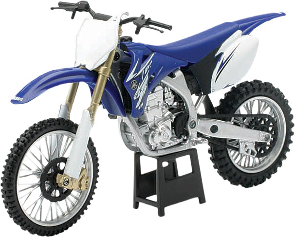 Detailed view of a New Ray Toys 1:12 scale Yamaha YZ450F 2009 die-cast replica motorcycle model with realistic features.