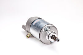 Ricks Motorsport Electric starter for motorsport vehicles, showcasing the compact electric starter with wiring and mounting components.