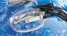 Load image into Gallery viewer, National Cycle clear hand deflector mounted on motorcycle handlebar, designed to block wind and debris for rider protection.