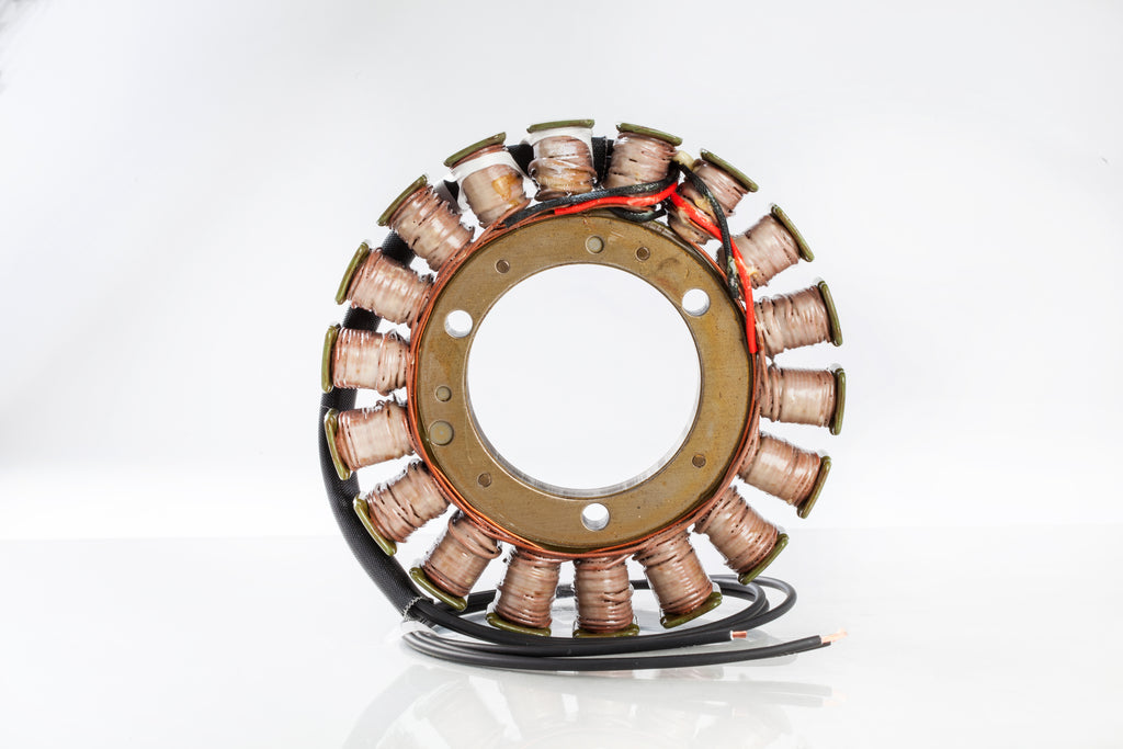 Electrical stator from Ricks Motorsport Electric with visible copper windings and metal mounting points for motorcycle ignition system.
