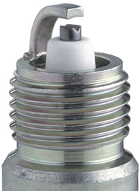 NGK spark plug #6630/04 2-UR4 showing the metal shell and ceramic insulator for automotive ignition systems