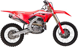Yoshimura Rs12 exhaust system shown with polished stainless steel muffler and sleek black components for motorcycle performance.