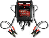 Yuasa 6V/12V battery charger with 2 banks, 2A capacity, used for charging various batteries in automotive or marine applications.