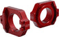 WORKS Axle Blocks Elite Hon Red drive axle blocks for secure wheel support in automotive or racing applications.