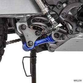 ZETA Blue Yam Lowering Suspension Link for Yamaha motorcycle, showing the blue metal linkage component.
