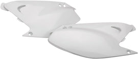 White Acerbis side panels for motorcycles, model 1590-2906, showing the sleek design and brand logo on the surface.