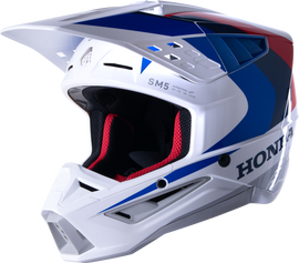 Alpine Star Honda S-M5 helmet in glossy white, blue, and red with large ventilation vents and aerodynamic design.