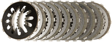 Load image into Gallery viewer, Energy One E1 clutch kit with friction plates and springs for 5/6-speed transmissions, suitable for automotive clutch repair.