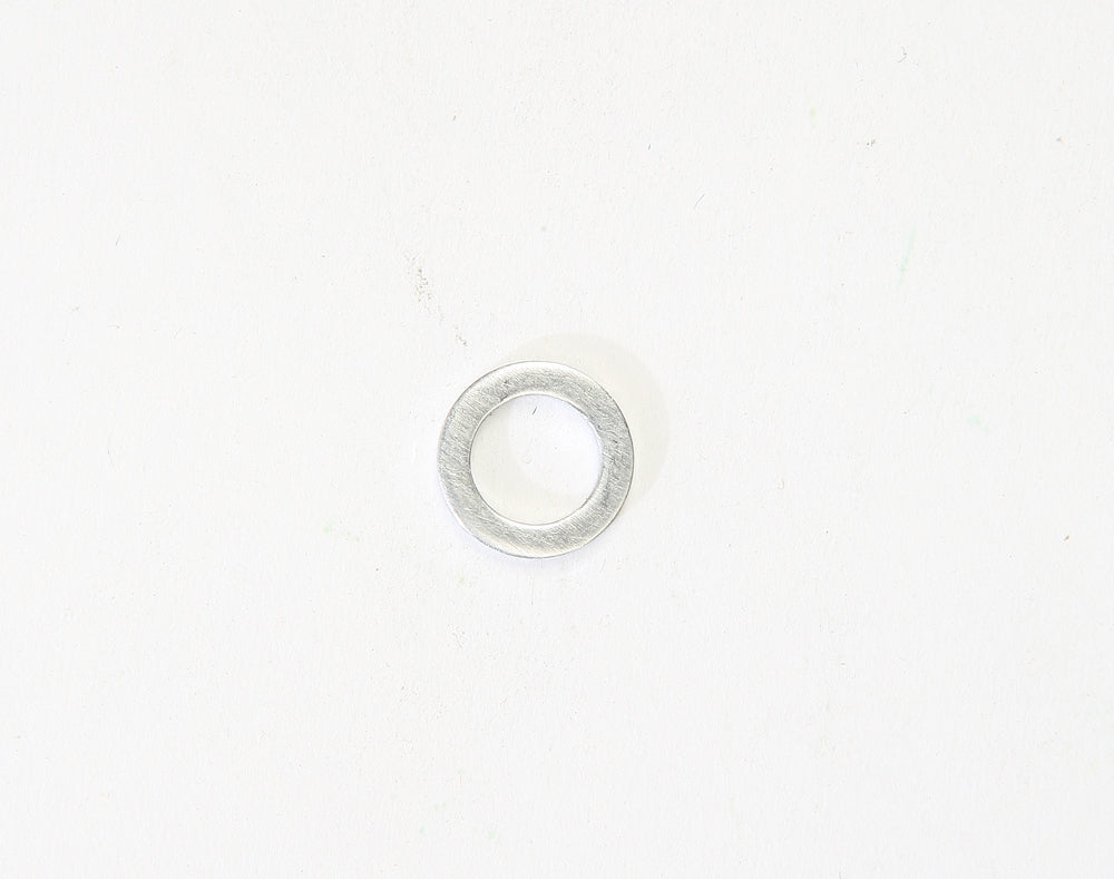 Mikuni low speed aluminum washer for intake, carb, or fuel system, shown in close-up view with metallic finish and detailed edges.