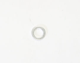 Mikuni low speed aluminum washer for intake, carb, or fuel system, shown in close-up view with metallic finish and detailed edges.