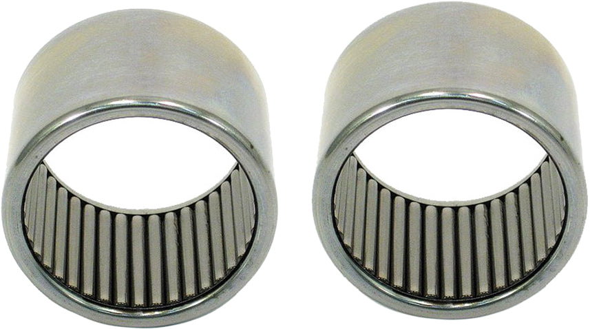Feuling engine inner cam bearings 811-02077, showcasing polished metal bearings inside a clear container for motorcycle engine repair.