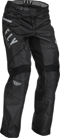 Fly Racing Patrol over-boot pants in black and white, size 34, featuring durable fabric and riding fit for motocross or dirt biking.