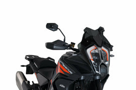 PUIG Sport dark smoke motorcycle windshield for KTM 561-20401D, showing sleek tinted windscreen mounted on bike.