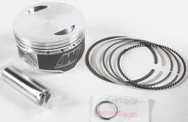 Wiseco Armorglide piston kit for Yamaha 85.50mm with +1.00mm and 11:1 compression ratio, showing pistons and components.