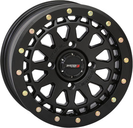 System 3 Sb6 Bl 15x7 matte black wheel with 4+3 offset for Can-Am Maverick, featuring a sleek design and 4/137 bolt pattern.