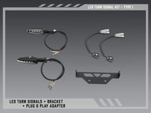 Load image into Gallery viewer, Yoshimura Fe V2 LED turn signal kit body parts with LED lights and wiring for motorcycle turn signal replacement.