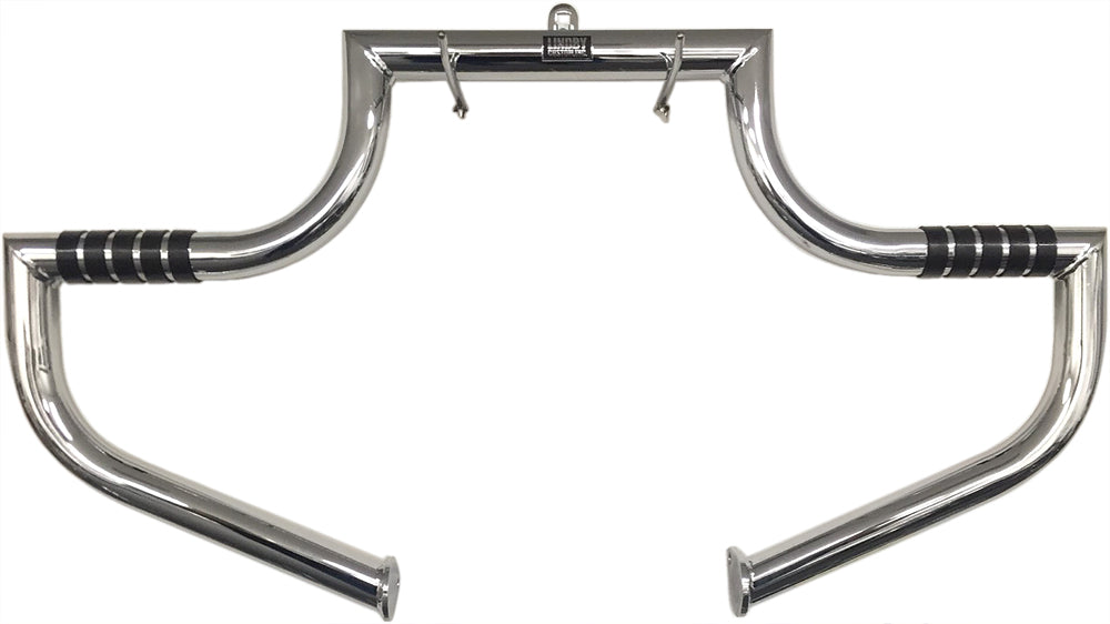 Chrome engine guard for Harley-Davidson touring models, Magnumbar FLH, 97 and up, by LINDBY, shown on a motorcycle body.