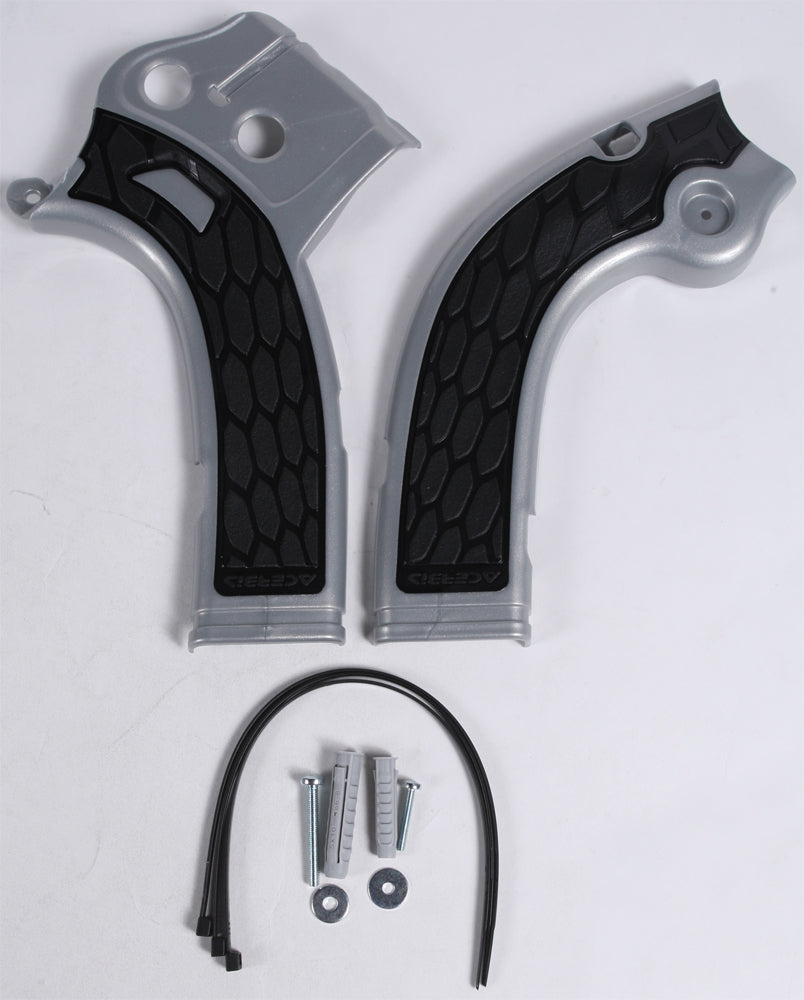 Acerbis X-Grip off-road frame guard in silver and black mounted on motorcycle frame, showing textured protective design.