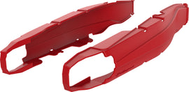 Polisport Plastics Swingarm Protectors in red, designed for motorcycle swingarms, shown on a bike in the image.