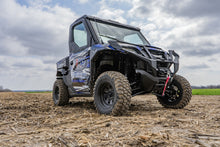 Charger l'image dans la galerie, ITP Tire Crosstrax 27x11R-14 8-Ply Radial tire with rugged tread for off-road vehicles, shown in close-up view.
