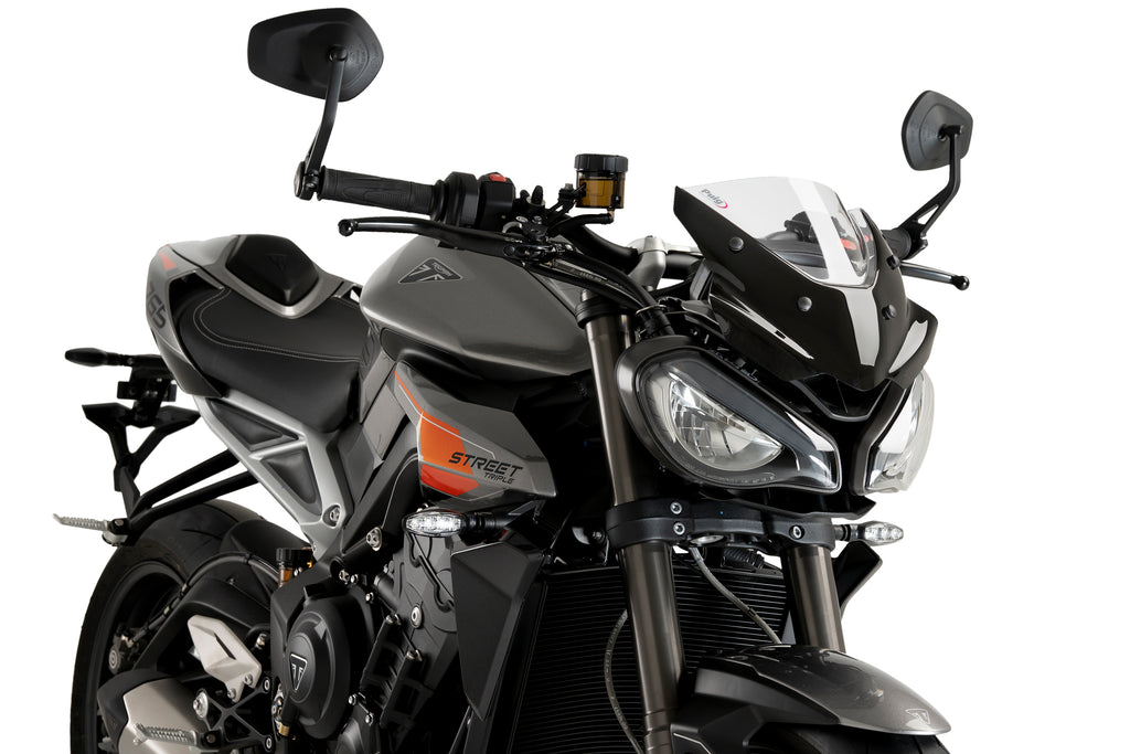 Clear PUIG Windscreen for Naked New Gen Sport motorcycle, showcasing its sleek, aerodynamic design and transparent material.
