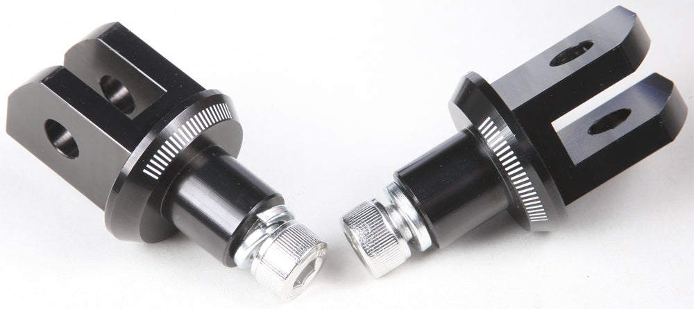 Black PUIG footpeg adapter for Yamaha motorcycle, showing the sturdy metal construction and mounting details.