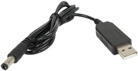 OXBOW GEAR LLC USB charger for Voyager light helmet accessory, shown connected to the helmet with visible charging port