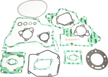 Load image into Gallery viewer, Athena Complete Gasket Kit Hon 68-0234 with various gaskets and seals laid out, designed for engine sealing.