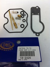 Load image into Gallery viewer, K&amp;L Carburetor Repair Kit 118-2426 for intake, carburetor, and fuel system with various gaskets and components laid out.