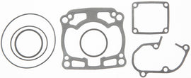 Cometic top end gasket kit for Kawasaki 68-7203, includes gaskets and seals arranged on a clean workspace.