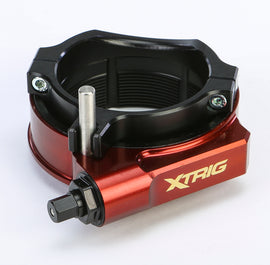 XTRIG Pre-Load Adjuster for Honda suspension, showing the black metal component with adjustment knob and mounting hardware.