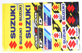 DCOR Suzuki decal sheet with various graphics and stickers for customizing Suzuki motorcycles, featuring bold, colorful designs.