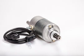 Ricks Motorsport Electric starter motor, model 27-61404, showing the compact electric starter with mounting components and wiring.