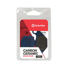 Load image into Gallery viewer, Brembo Prime CC brake pads in black carbon ceramic with visible Brembo branding and metal backing plates.